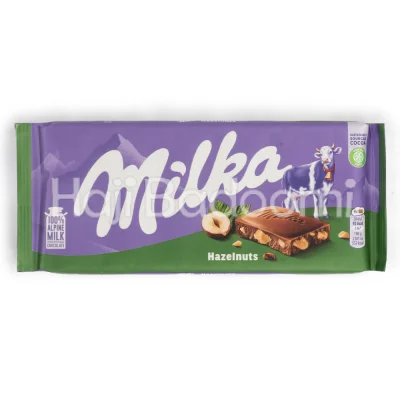 شکلات تخته‌ ای میلکا با تکه های فندق 100 گرمی